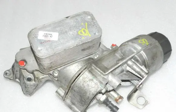 Lancia Thema Oil filter mounting bracket K68504665AA K68211440AB