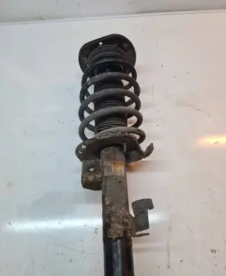Front shock absorber with coil spring
