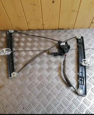 Ford Fiesta Front door window regulator with motor 2S5114553AA
