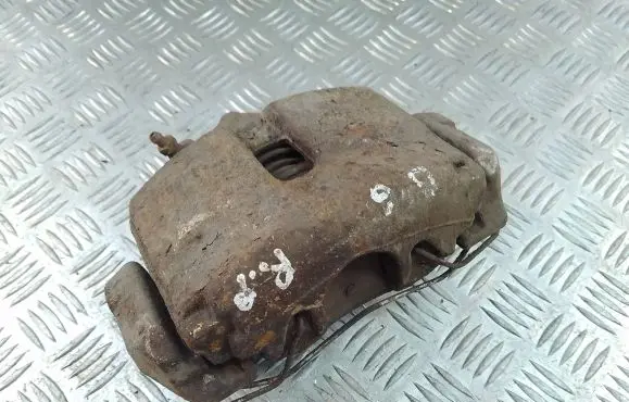 Volkswagen Golf VI Front brake caliper