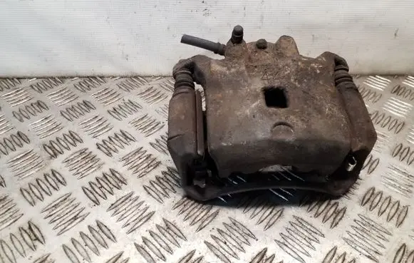 Nissan Juke I F15 Front brake caliper