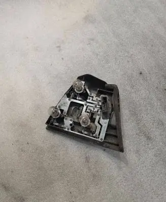 Tail light bulb cover holder