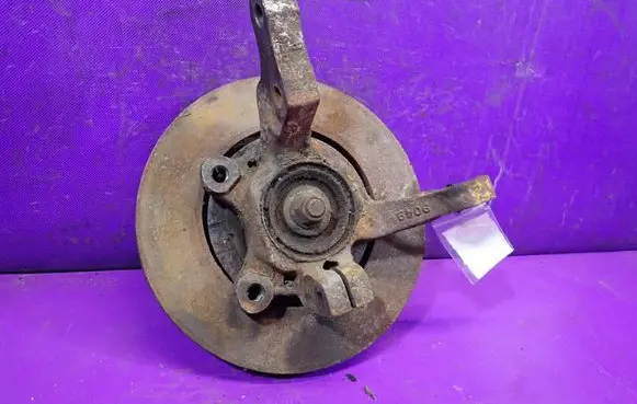 Chrysler LeBaron Front wheel hub spindle knuckle 