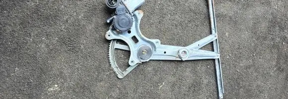 Toyota Camry Front door window regulator with motor 8571433120 062040-1690