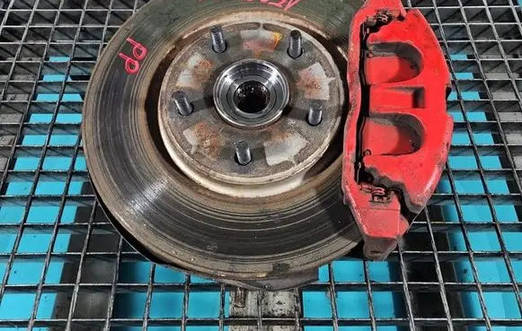 Front wheel hub spindle knuckle