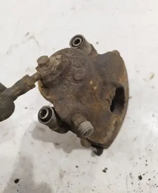Volkswagen Golf V Front brake caliper