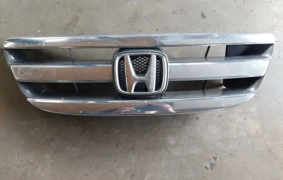Honda FR-V Front bumper upper radiator grill