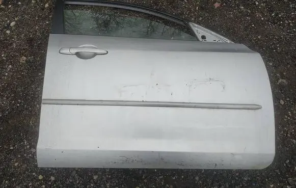 Mazda 3 I Front door PILKOS