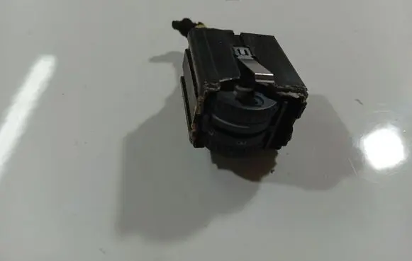 Headlight level height control switch