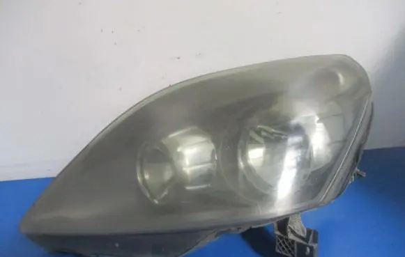 Opel Zafira B Headlight/headlamp 24451052LH
