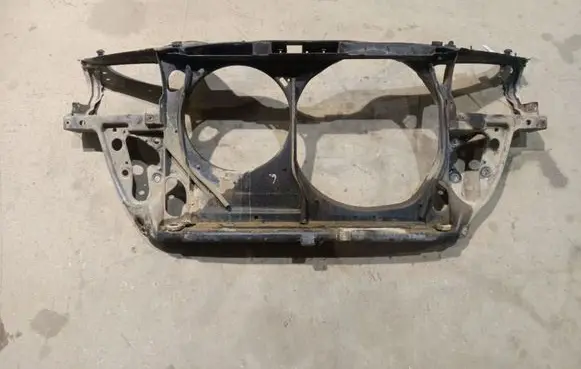 Radiator support slam panel