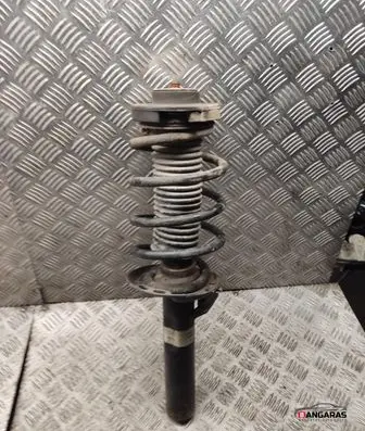 Volkswagen Caddy Front shock absorber with coil spring 