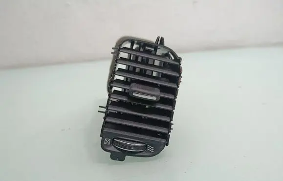 Dash center air vent grill