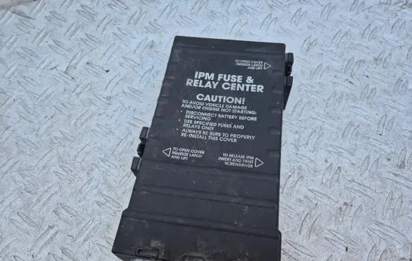 Chrysler Voyager Fuse box cover 04869107AE