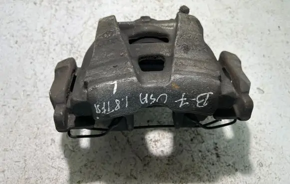 Volkswagen PASSAT B7 Front brake caliper