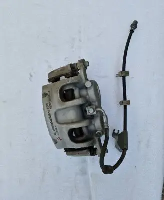 Jeep Grand Cherokee WL Front brake caliper 68338904AA