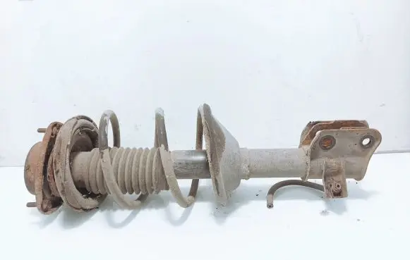 Subaru Legacy Front shock absorber with coil spring