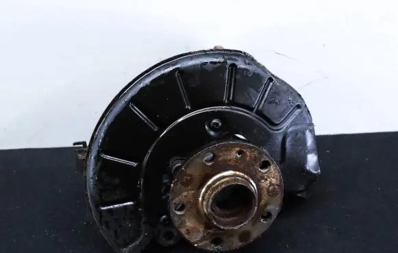 Volkswagen Touran I Front wheel hub spindle knuckle 1K0407255AA