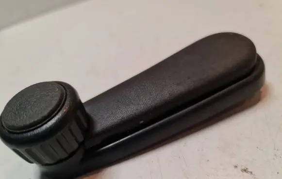 Volkswagen Golf II Front door window winding handle 191837579