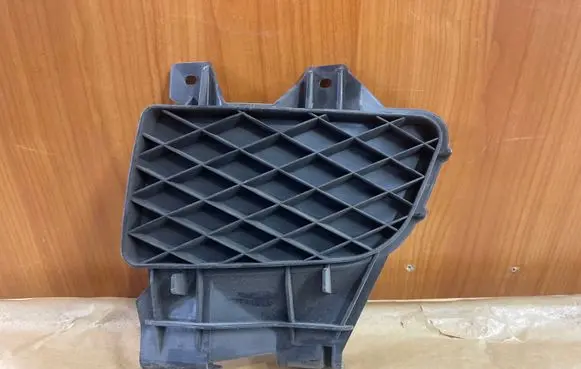 Mazda 323 Front bumper lower grill MZ04079021A