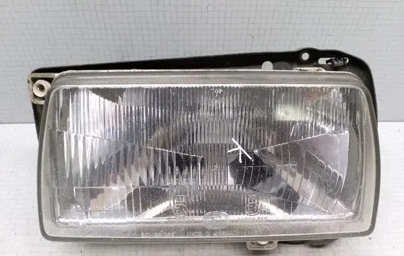 Volkswagen Jetta II Headlight/headlamp 12906400 12906401