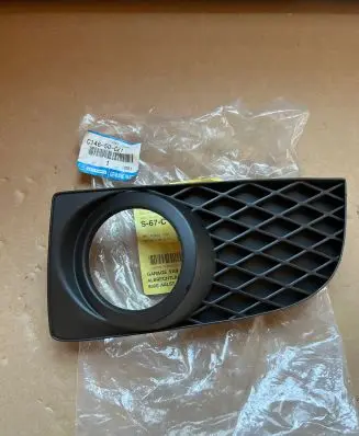 Mazda Premacy Front fog light trim/grill C14650C21