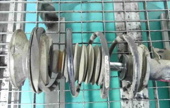 Front coil spring
