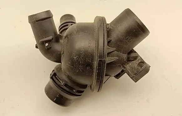 Thermostat/thermostat housing