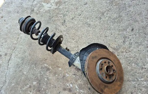 Jeep Cherokee Front shock absorber with coil spring