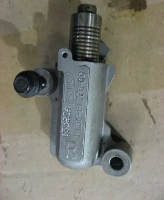 Lincoln Navigator Timing belt/chain tensioner JS382AB HL3E6L266CC