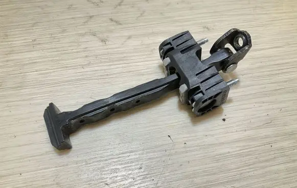Volvo XC90 Front door check strap stopper