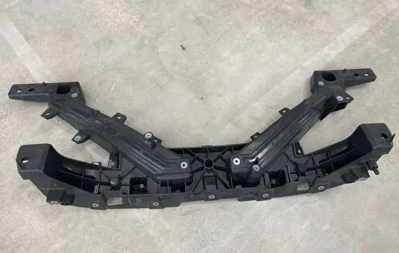 Radiator support slam panel