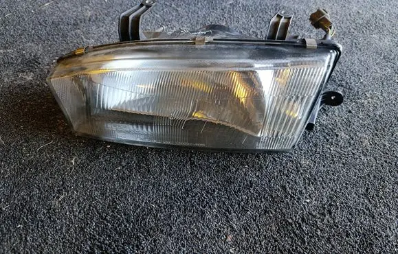 Subaru Legacy Headlight/headlamp 10020580