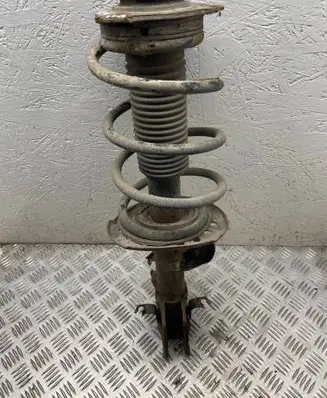 Nissan Juke I F15 Front shock absorber with coil spring 543211ka9b