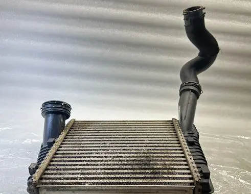 Volkswagen Touareg I Intercooler radiator 7L6145804 E3705003 7L6145738