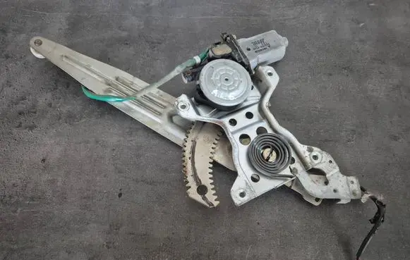 Rear door window regulator with motor