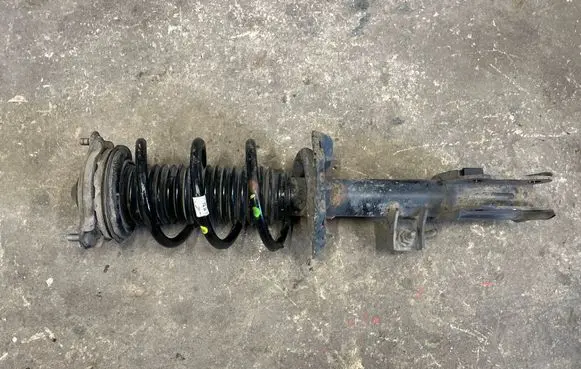 Front shock absorber with coil spring