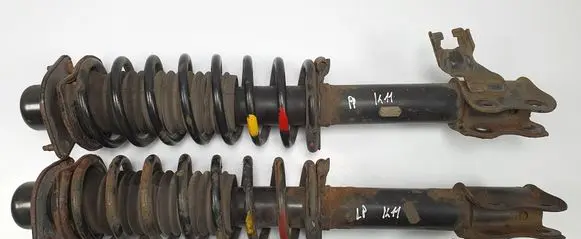 Nissan Micra Front shock absorber with coil spring 543036F600