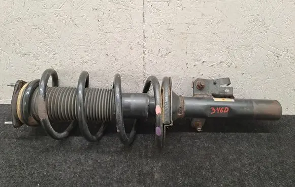 Front shock absorber with coil spring