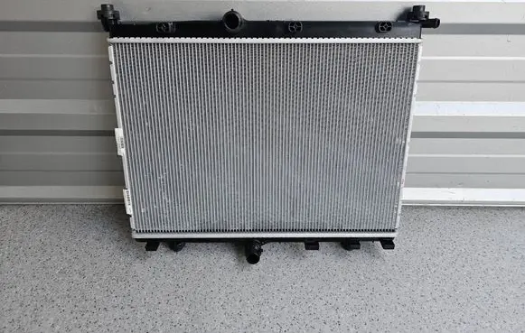 Opel Corsa F Coolant radiator 9827174680