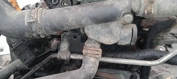 Volkswagen Touran I Engine coolant pipe/hose 038121132D