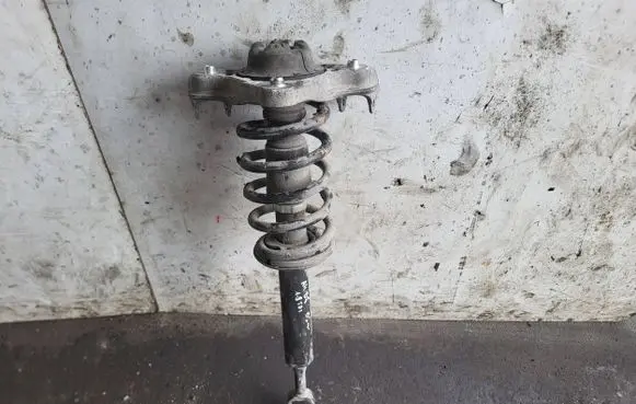 Front shock absorber with coil spring