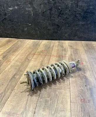 Nissan Navara D23 Front shock absorber with coil spring 561105JU1A ET1K4101