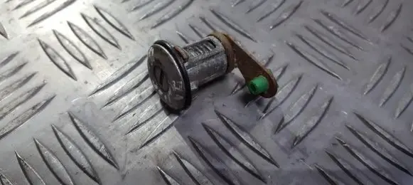 Nissan Terrano Front door lock (next to the handle) 