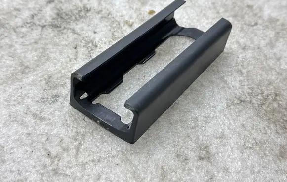 Tesla Model Y Front driver seat rail trim 156657300A