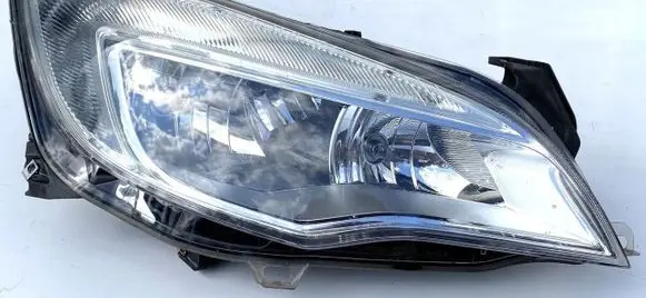 Opel Astra J Headlight/headlamp 13253647