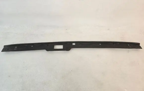 Engine bonnet/hood lock trim molding