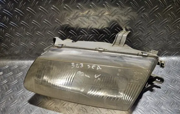 Mazda 323 Headlight/headlamp 203115B 203115