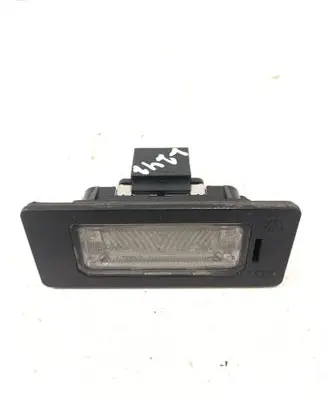 Volkswagen PASSAT B6 Number plate light 8T0943021 E26016