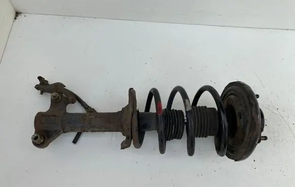 Front shock absorber with coil spring